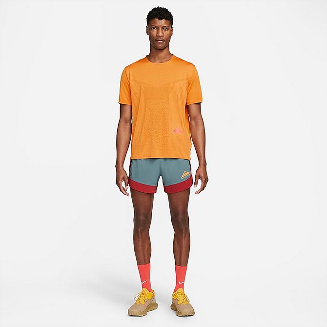 Back Left view of Men's Nike Dri-FIT Rise 365 Short-Sleeve Trail Running Top in Light Curry/Habanero Red Click to zoom