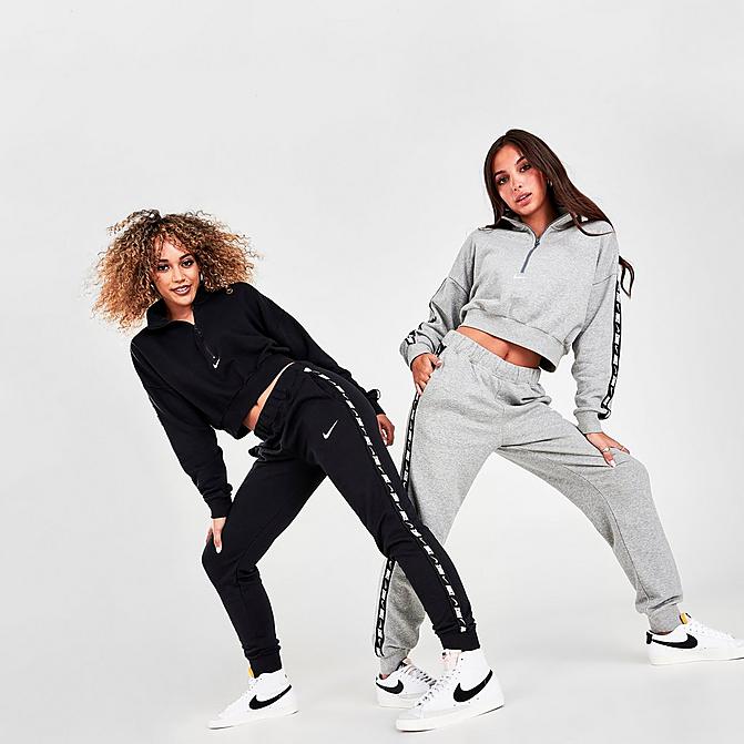 Front view of Women's Nike Sportswear Essential Tape Fleece Jogger Pants in Black/White Click to zoom