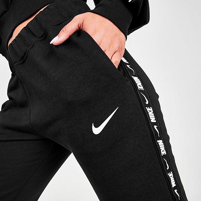 On Model 6 view of Women's Nike Sportswear Essential Tape Fleece Jogger Pants in Black/White Click to zoom