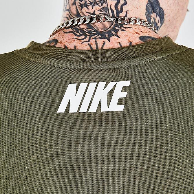On Model 6 view of Men's Nike Sportswear Repeat Fleece Crewneck Sweatshirt in Medium Olive/White Click to zoom
