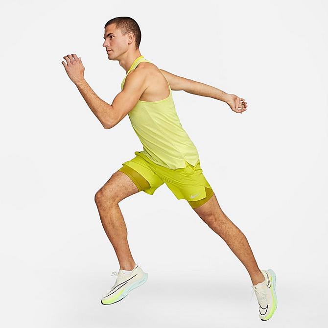 Front Three Quarter view of Men's Nike Dri-FIT Stride 2-in-1 7" Running Shorts in Bright Cactus/Moss/Moss Click to zoom