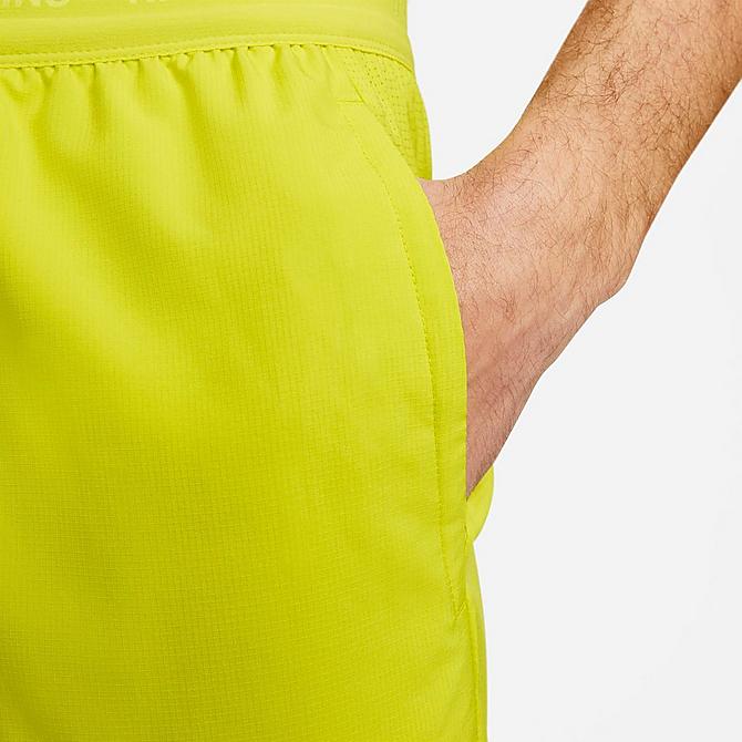Back Right view of Men's Nike Dri-FIT Stride 2-in-1 7" Running Shorts in Bright Cactus/Moss/Moss Click to zoom