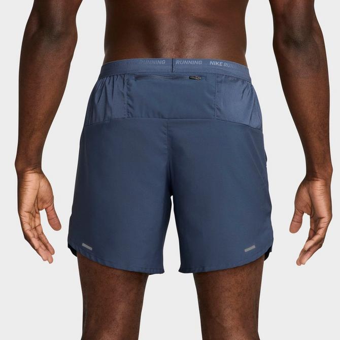[angle] view of Men's Nike Dri-FIT Stride Brief-Lined 7-Inch Running Shorts in Thunder Blue/Black Click to zoom