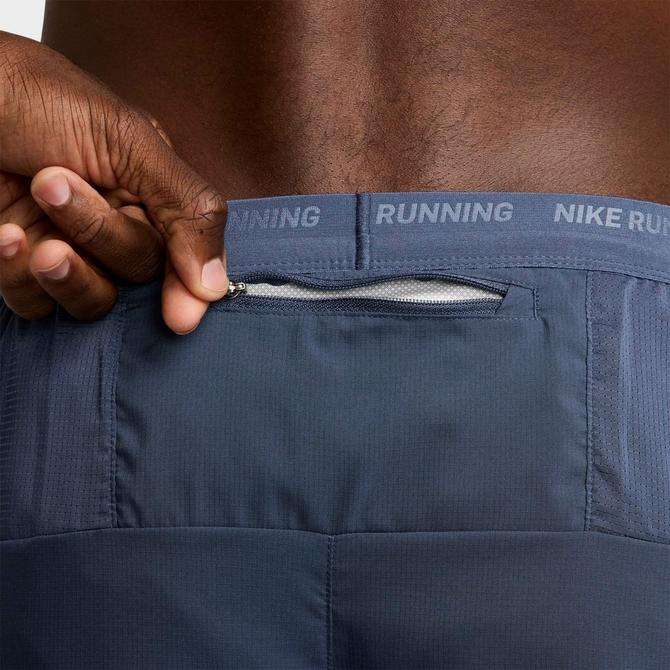 [angle] view of Men's Nike Dri-FIT Stride Brief-Lined 7-Inch Running Shorts in Thunder Blue/Black Click to zoom