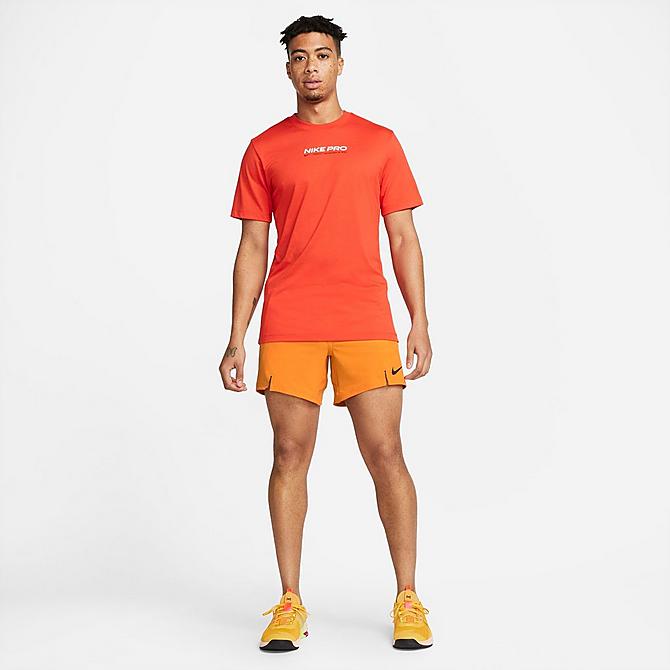 Back Left view of Men's Nike Pro Dri-FIT Flex 6" Training Shorts in Kumquat/Black Click to zoom