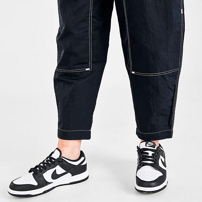On Model 6 view of Women's Nike Sportswear Swoosh Woven High-Rise Cargo Pants in Black/Black/White/White Click to zoom