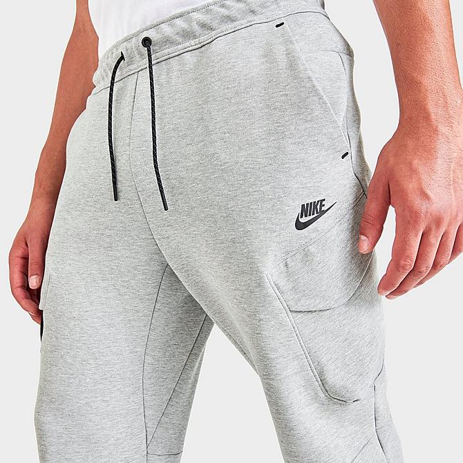 On Model 5 view of Men's Nike Sportswear Tech Fleece Cargo Utility Pants in Heather Grey/Black Click to zoom