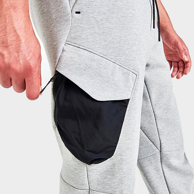 On Model 6 view of Men's Nike Sportswear Tech Fleece Cargo Utility Pants in Heather Grey/Black Click to zoom