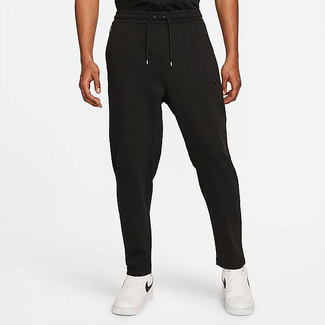 Front view of Men's Nike Sportswear Lightweight Open Hem Knit Pants in Black/Black/Black Click to zoom