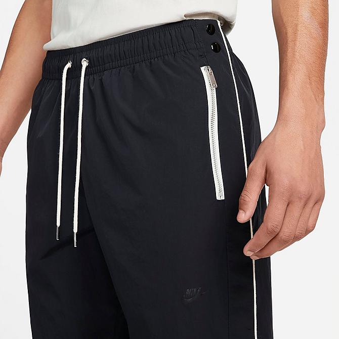 Back Right view of Men's Nike Sportswear Style Essentials Tearaway Pants in Black/Sail/Ice Silver/Black Click to zoom