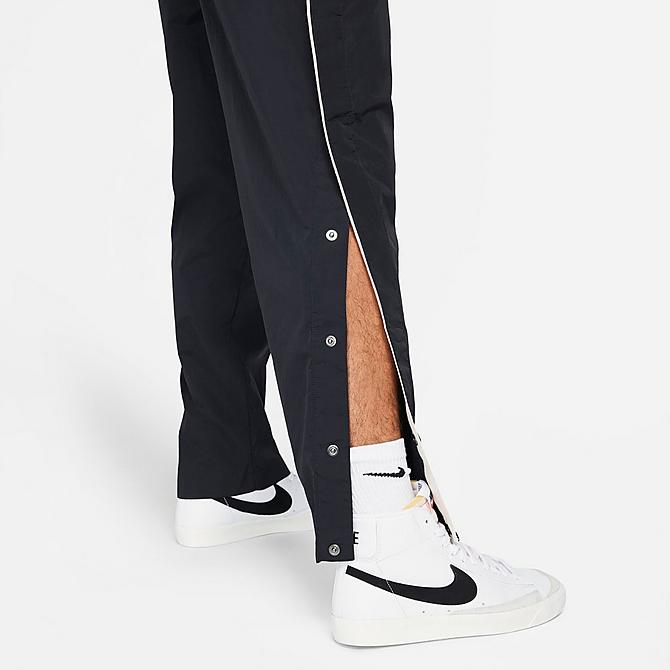 On Model 5 view of Men's Nike Sportswear Style Essentials Tearaway Pants in Black/Sail/Ice Silver/Black Click to zoom