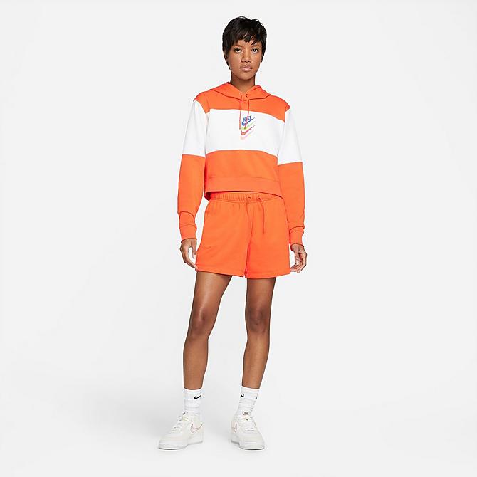 On Model 5 view of Women's Nike Sportswear Stacked Swoosh Hoodie in Rush Orange/White Click to zoom