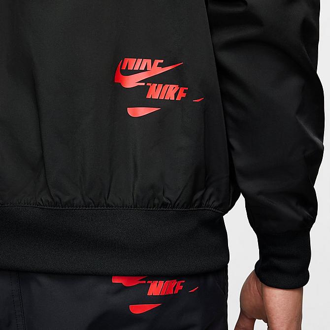 On Model 6 view of Men's Nike Sportswear Sport Essentials+ Windrunner Woven Windbreaker Jacket in Black/White Click to zoom