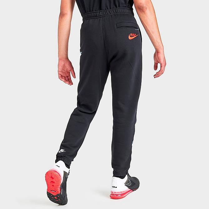 Back Right view of Men's Nike Sportswear Sport Essentials+ Glitch Club Fleece Sweatpants in Black/White Click to zoom