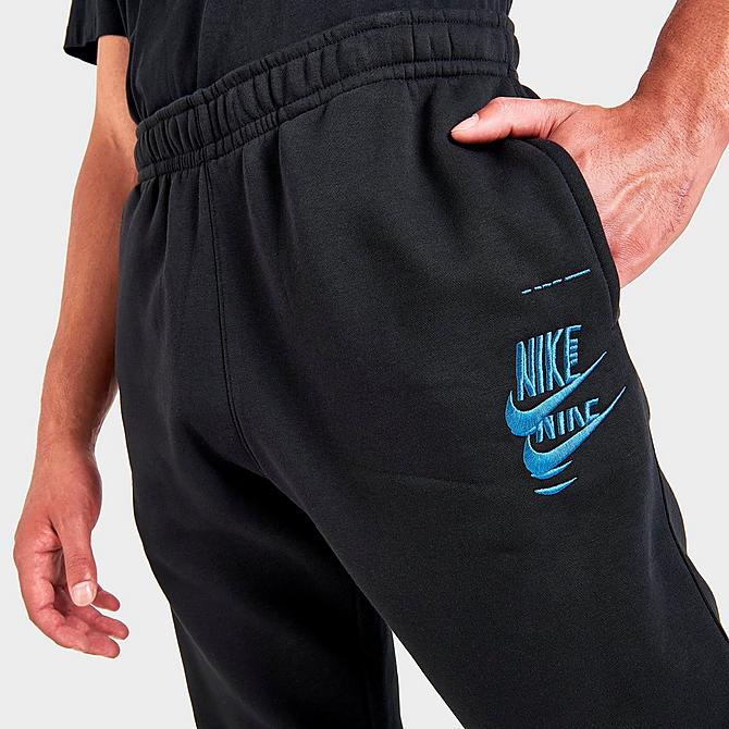 On Model 5 view of Men's Nike Sportswear Sport Essentials+ Glitch Club Fleece Sweatpants in Black/White Click to zoom