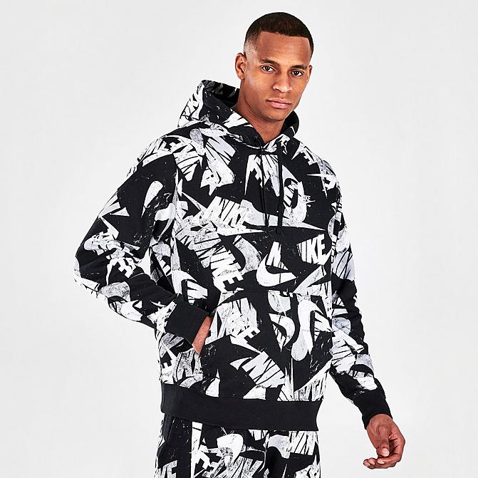 Front view of Men's Nike Sportswear Sport Essentials+ All-Over Print Pullover Hoodie in Black/White Click to zoom