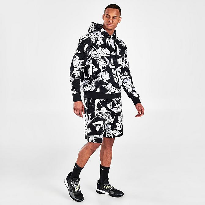 Front Three Quarter view of Men's Nike Sportswear Sport Essentials+ Allover Print Shorts in Black/White Click to zoom