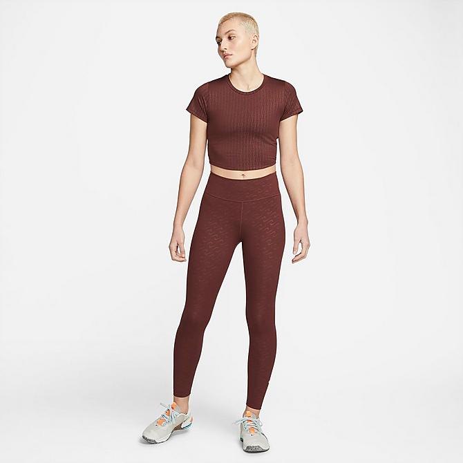 On Model 5 view of Women's Nike Dri-FIT One Luxe Slim Fit Printed Top in Bronze Eclipse Click to zoom
