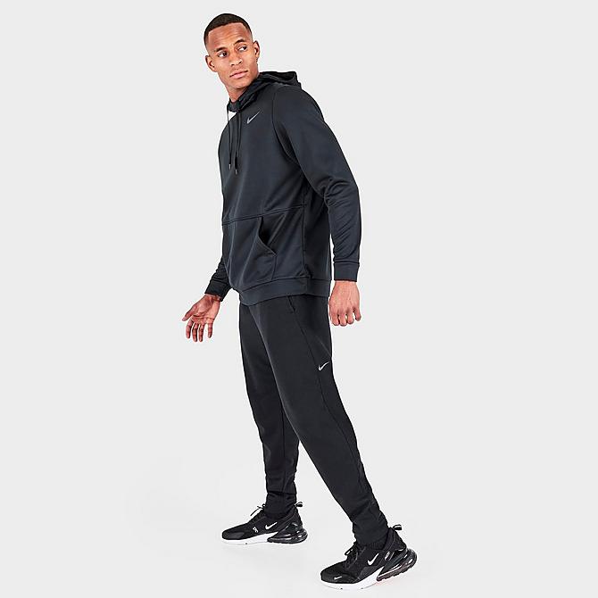 Front Three Quarter view of Men's Nike Yoga Therma-FIT Pants in Black/Iron Grey Click to zoom