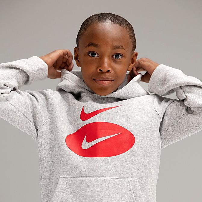 Front view of Boys' Nike Sportswear Swoosh Pack Pullover Hoodie in Grey Heather/Team Red/University Red Click to zoom