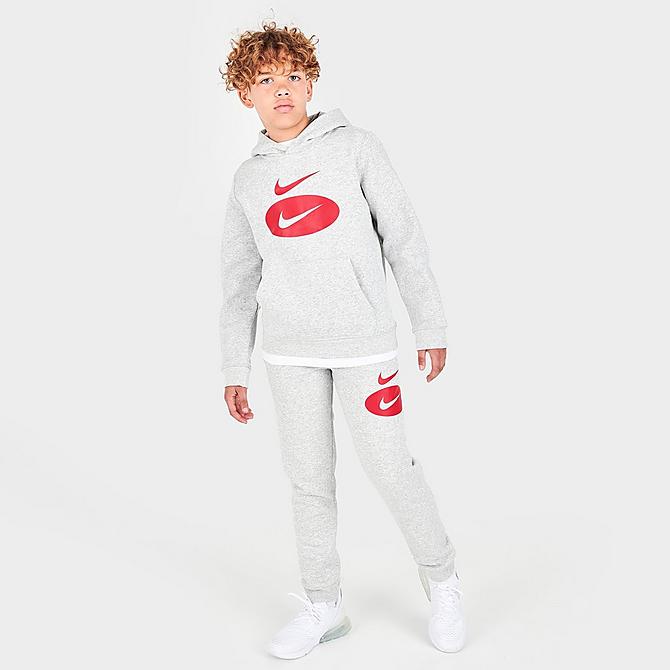 Front Three Quarter view of Boys' Nike Sportswear Swoosh Pack Pullover Hoodie in Grey Heather/Team Red/University Red Click to zoom