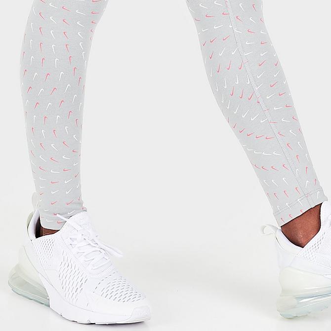 On Model 6 view of Girls' Nike Sportswear Essential Swooshfetti Printed Leggings in Light Smoke Grey/Pink Salt Click to zoom