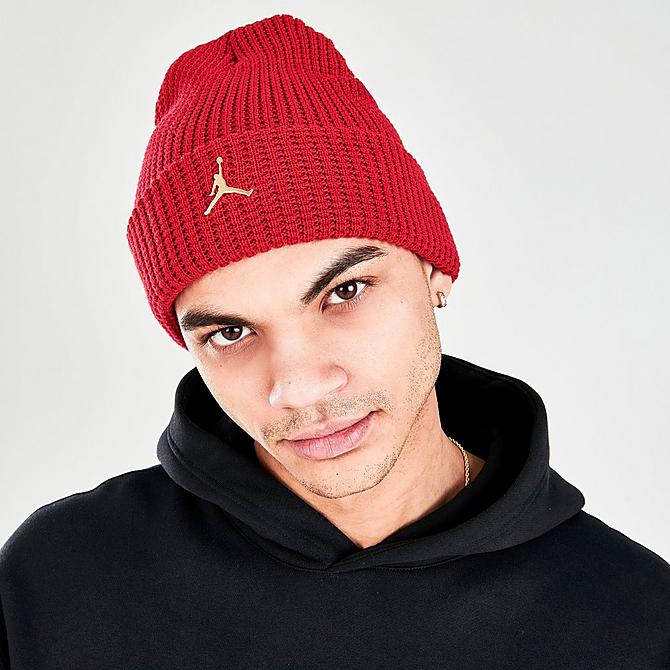Front view of Jordan Utility Beanie Hat in Gym Red/Metallic Gold Click to zoom