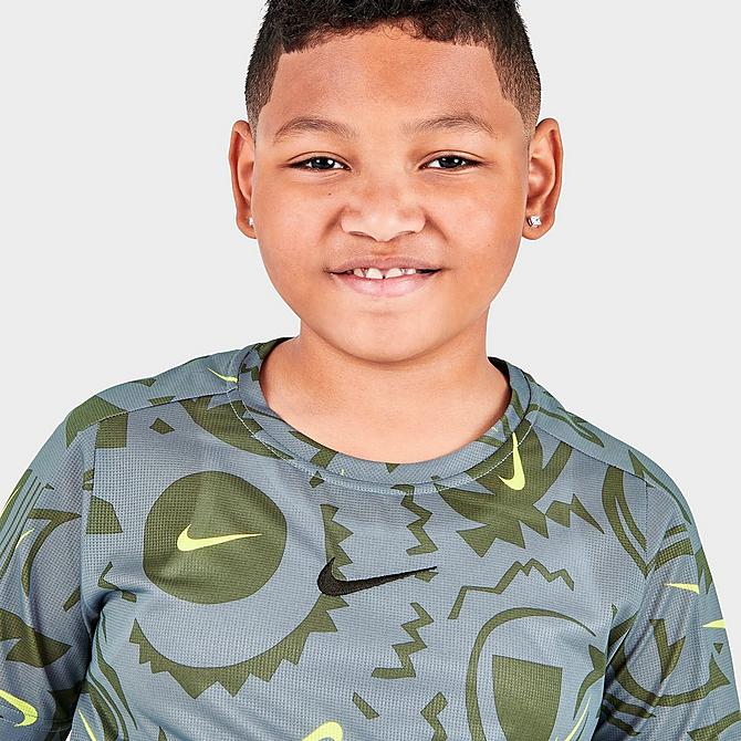 On Model 5 view of Boys' Nike Allover Print Dri-FIT Training Top in Smoke Grey/Black Click to zoom