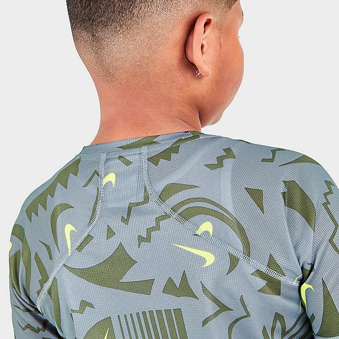 On Model 6 view of Boys' Nike Allover Print Dri-FIT Training Top in Smoke Grey/Black Click to zoom