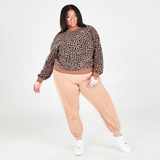 Front Three Quarter view of Women's Nike Sportswear Allover Print Fleece Crewneck Sweatshirt (Plus Size) in Archaeo Brown Click to zoom