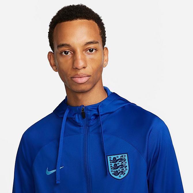 [angle] view of Men's Nike England Strike Hooded Track Jacket in Game Royal/Blue Fury Click to zoom