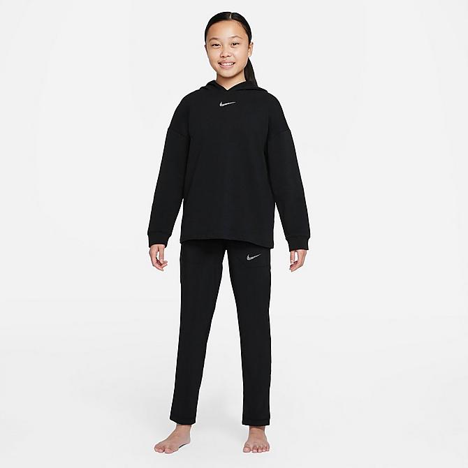 On Model 5 view of Girls' Nike Yoga Dri-FIT Woven Pants in Black Click to zoom