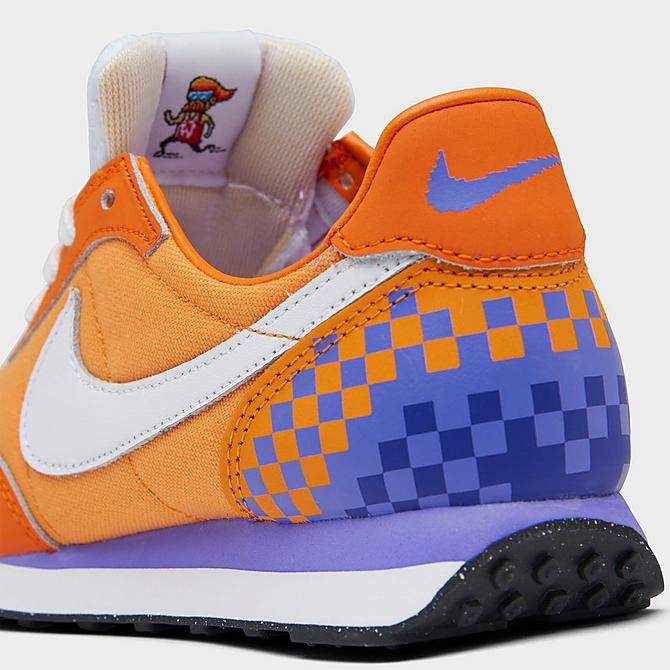 Front view of Little Kids' Nike Waffle Trainer 2 SE Casual Shoes in Kumquat/White/Psychic Purple Click to zoom