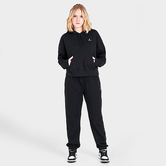 Front Three Quarter view of Women's Jordan Essentials Fleece Hoodie in Black Click to zoom