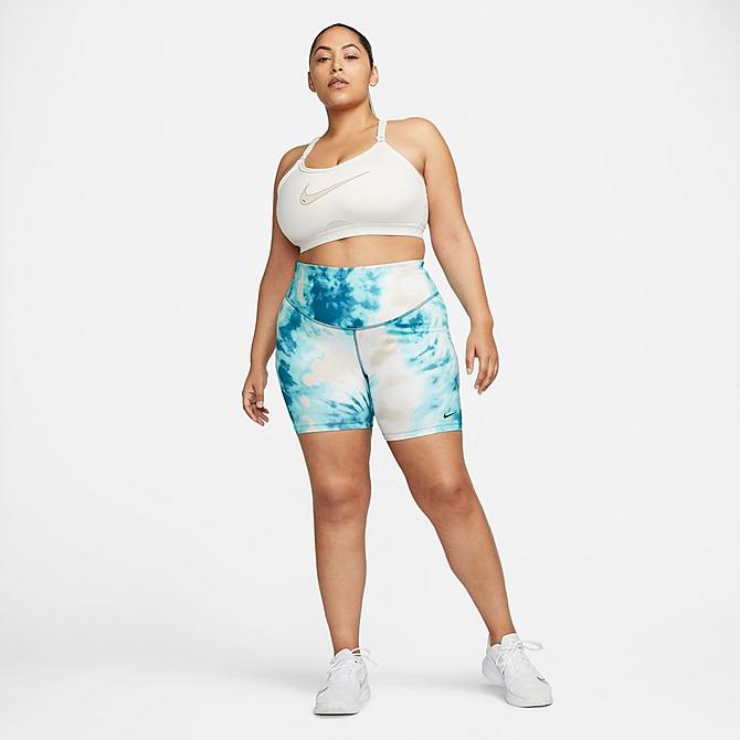 Front Three Quarter view of Women's Nike Dri-FIT Indy Padded Graphic Light-Support Sports Bra (Plus Size) in Phantom/Phantom/Black/Sanddrift Click to zoom