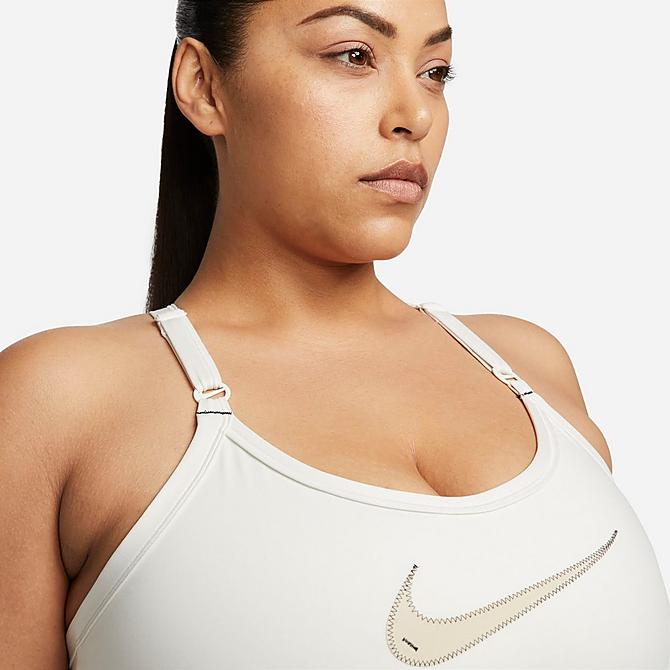 Back Right view of Women's Nike Dri-FIT Indy Padded Graphic Light-Support Sports Bra (Plus Size) in Phantom/Phantom/Black/Sanddrift Click to zoom