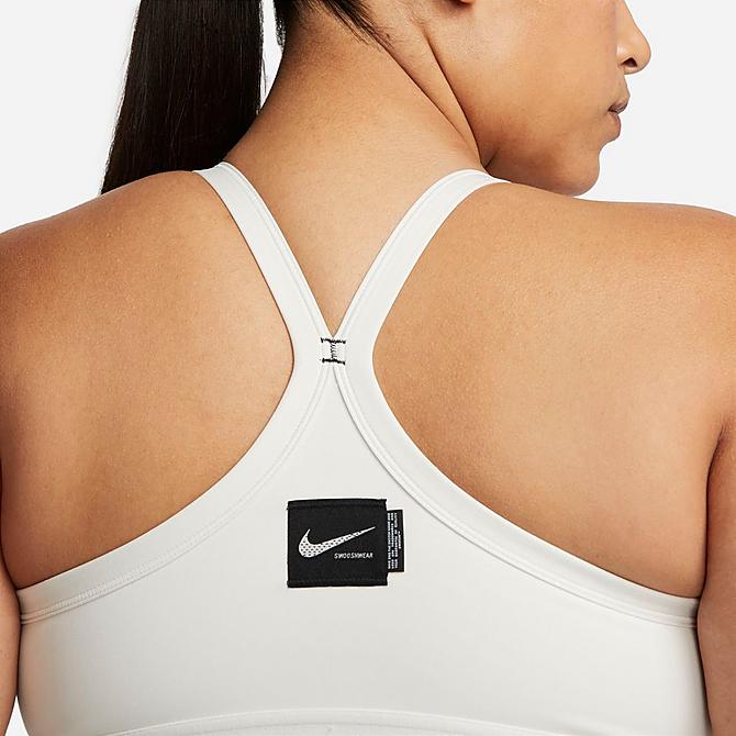On Model 5 view of Women's Nike Dri-FIT Indy Padded Graphic Light-Support Sports Bra (Plus Size) in Phantom/Phantom/Black/Sanddrift Click to zoom