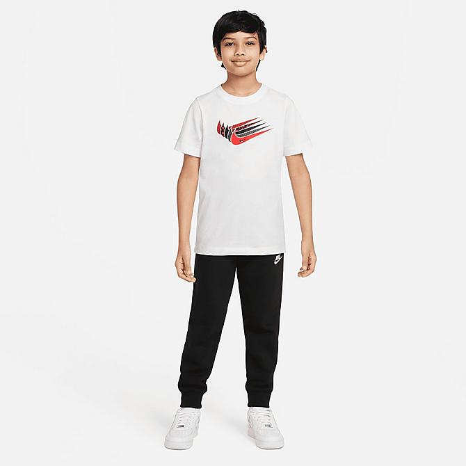 Front Three Quarter view of Girls' Nike Sportswear Repeat Futura T-Shirt in White Click to zoom