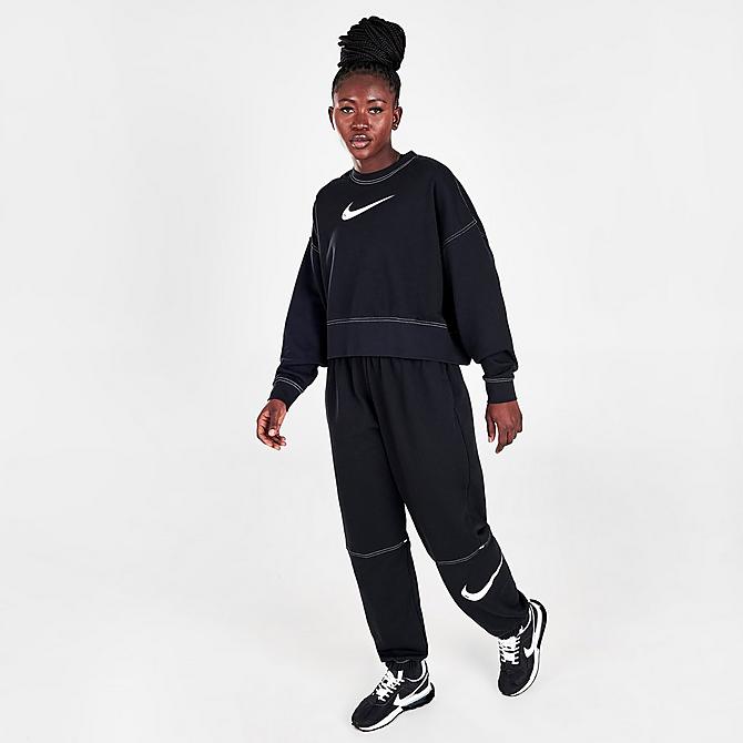 Front Three Quarter view of Women's Nike Sportswear Swoosh Cropped Crewneck Sweatshirt in Black/Black/White Click to zoom
