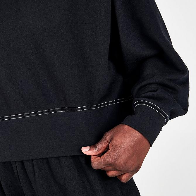 On Model 6 view of Women's Nike Sportswear Swoosh Cropped Crewneck Sweatshirt in Black/Black/White Click to zoom