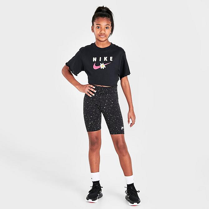 Front Three Quarter view of Girls' Nike Sportswear Allover Print Speckle Bike Shorts in Black/White Click to zoom