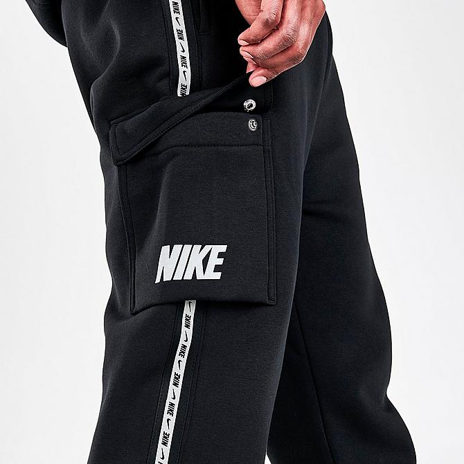 On Model 6 view of Men's Nike Sportswear Repeat Jogger Pants in Black/Reflective Silver Click to zoom