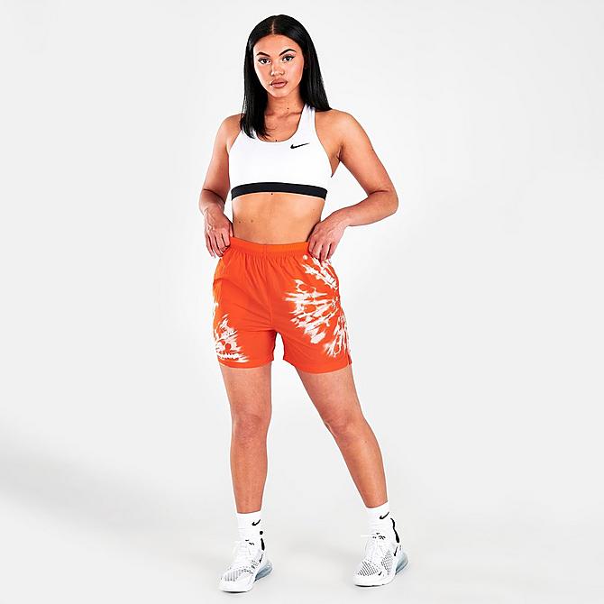 Front Three Quarter view of Women's Nike Sportswear Woven Resort Shorts in Orange Click to zoom