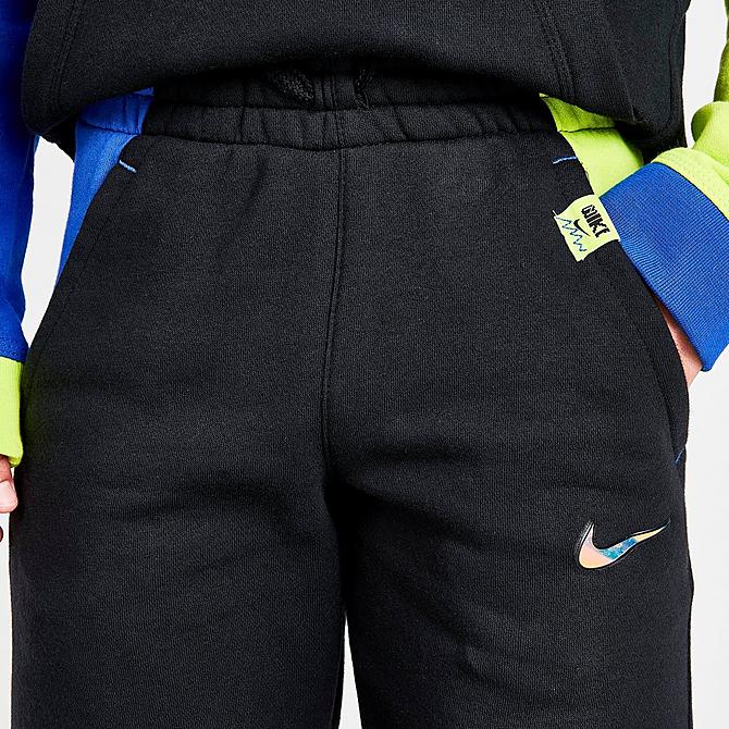 On Model 5 view of Boys' Nike Sportswear Digi Logo Colorblock Jogger Pants in Black/Game Royal/Cyber Click to zoom