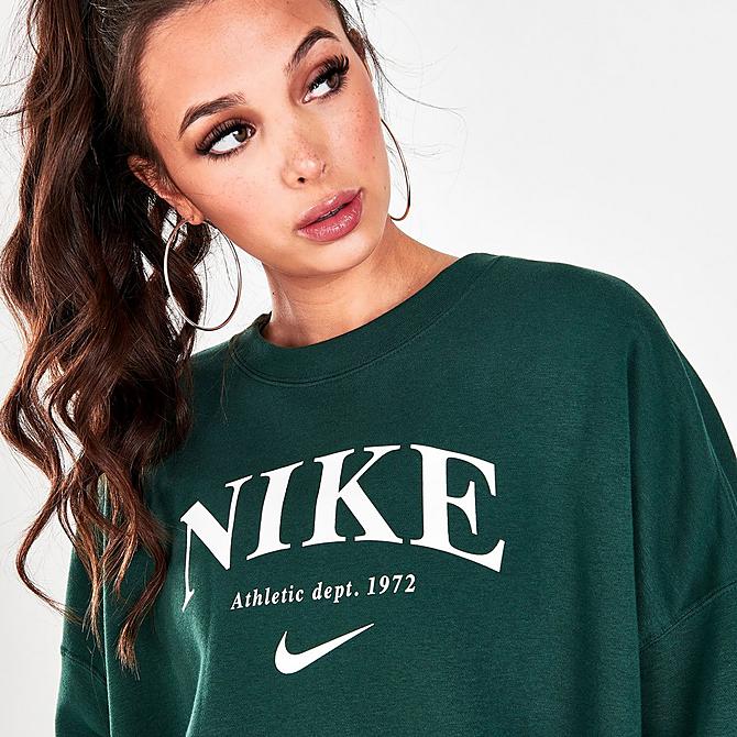 On Model 6 view of Women's Nike Sportswear Essentials Oversized Fleece Sweatshirt in Coconut Milk Click to zoom