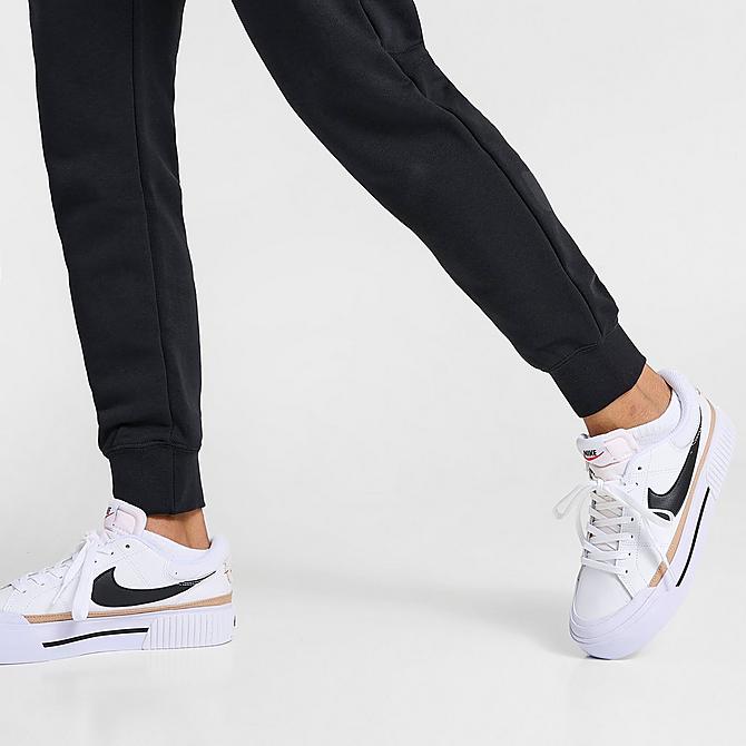 On Model 6 view of Women's Nike Sportswear Club Fleece Mid-Rise Jogger Pants in Black/White Click to zoom