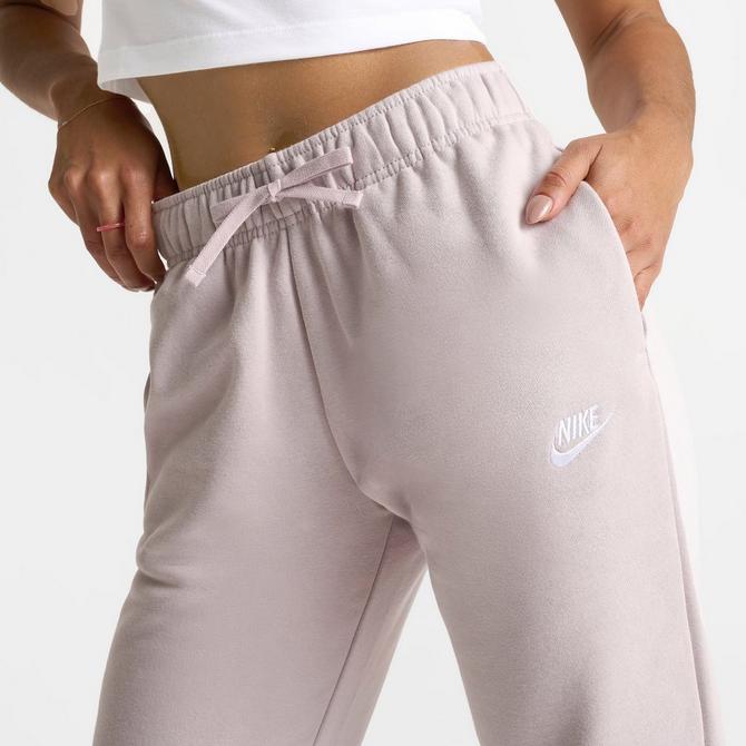 [angle] view of Women's Nike Sportswear Club Fleece Mid-Rise Jogger Pants in Platinum Violet/White Click to zoom