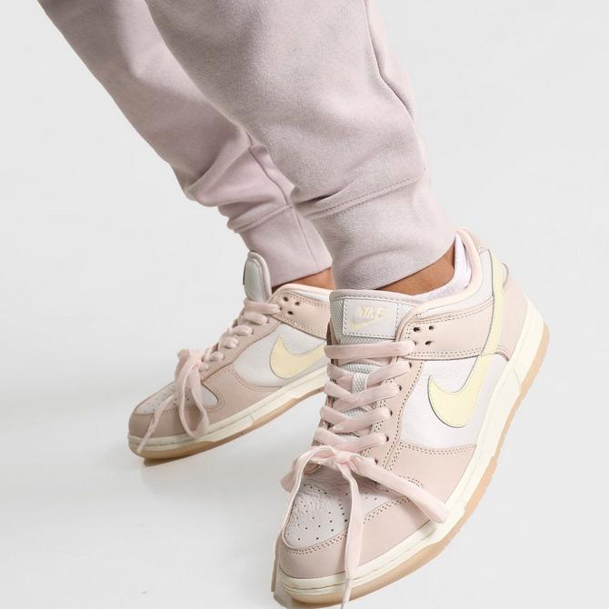 [angle] view of Women's Nike Sportswear Club Fleece Mid-Rise Jogger Pants in Platinum Violet/White Click to zoom