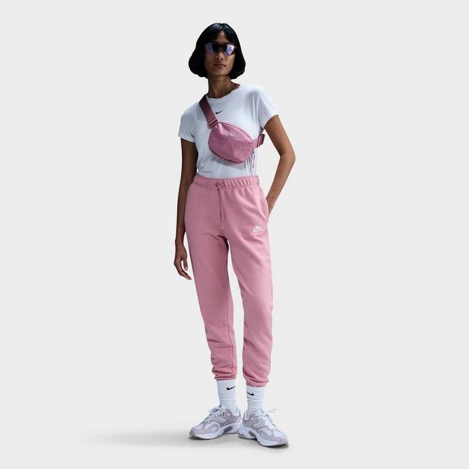 [angle] view of Women's Nike Sportswear Club Fleece Mid-Rise Jogger Pants in Elemental Pink/Heather/White Click to zoom