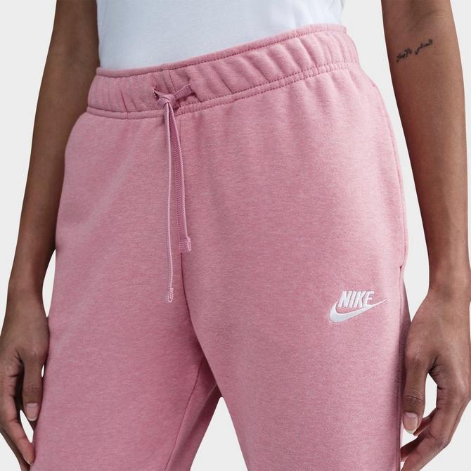 [angle] view of Women's Nike Sportswear Club Fleece Mid-Rise Jogger Pants in Elemental Pink/Heather/White Click to zoom